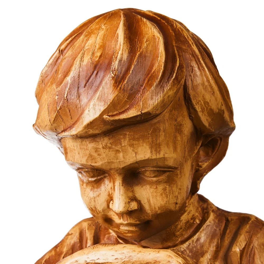 Boy with firefly light statue